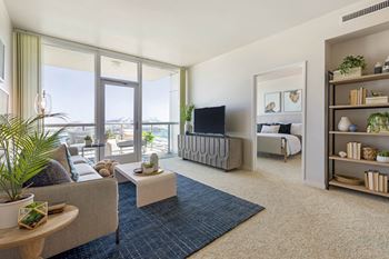 A living room with a couch and a tv 
